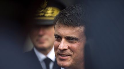 Manuel Valls &agrave; Conflans-Sainte-Honorine (Yvelines), le 25 septembre 2013. (FRED DUFOUR / AFP)