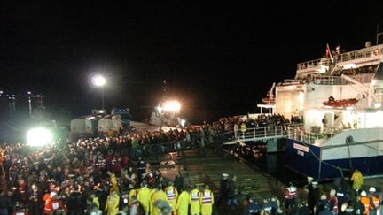 Turcs à leur arrivée à Marmaris (Turquie) après leur fuite de la Libye le 23/02/2011