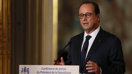 Fran&ccedil;ois Hollande lors de sa quatri&egrave;me conf&eacute;rence de presse pr&eacute;sidentielle &agrave; l'Elys&eacute;e, le 18 septembre 2014. (PATRICK KOVARIK / AFP)