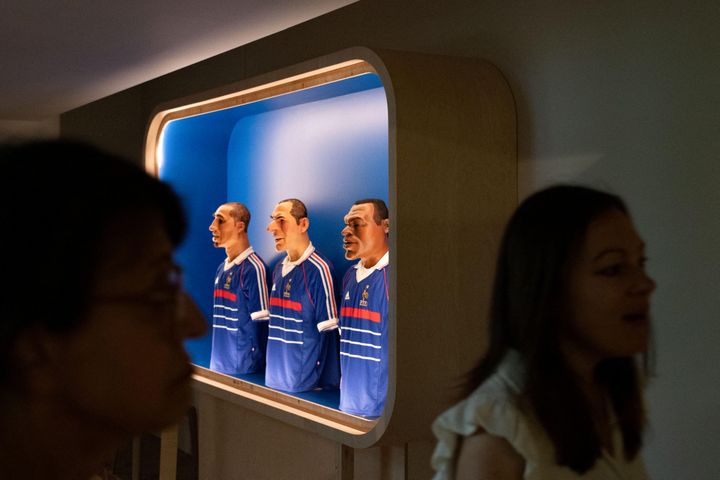 This work representing the puppets of David Trezeguet (L), Zinedine Zidane (C) and Marcel Desailly for the show " The horns of info" is on display at the National Museum of the History of Immigration in the permanent collection, in Paris (AFP)