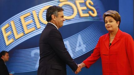 &nbsp; (Aécio Neves et Dilma Rousseff lors d'un ultime débat télévisé vendredi soir © REUTERS/Ricardo Moraes)