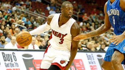 L'arrière du Heat de Miami, Dwyane Wade, s'est montré décisif dans le money time. (ANDY LYONS / GETTY IMAGES NORTH AMERICA)