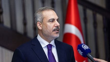 The head of Turkish diplomacy, Hakan Fidan, speaks after an informal NATO meeting in Prague (Czech Republic), May 31, 2024. (MURAT GOK / ANADOLU / AFP)