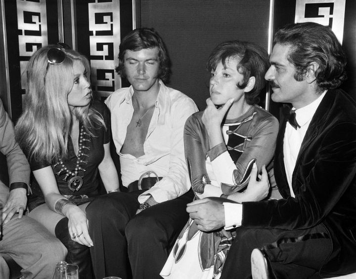 En Juillet 1969 à Deauville, Régine en compagnie de Brigitte Bardot, Patrick Gilles et Omar Sharif
 (ARCHIVE / AFP)