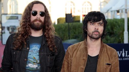 Gaspard Augé (à gauche) et Xavier de Rosnay (à droite), du duo Justice, le 4 septembre 2013 au festival du film américain de Dauville. (CHARLY TRIBALLEAU / AFP)