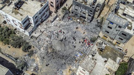 Des immeubles effondrés à Gaza sous les frappes israéliennes, le 6 août 2022. (MOHAMMED ABED / AFP)