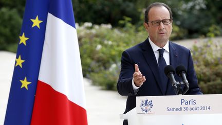 Fran&ccedil;ois Hollande tient une conf&eacute;rence de presse &agrave; l'Elys&eacute;e, le 30 ao&ucirc;t 2014. (KENZO TRIBOUILLARD / AFP)