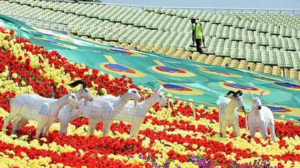 les jardins sont décorés de chèvres…
 
 (AFP PHOTO / ROSLAN RAHMAN)