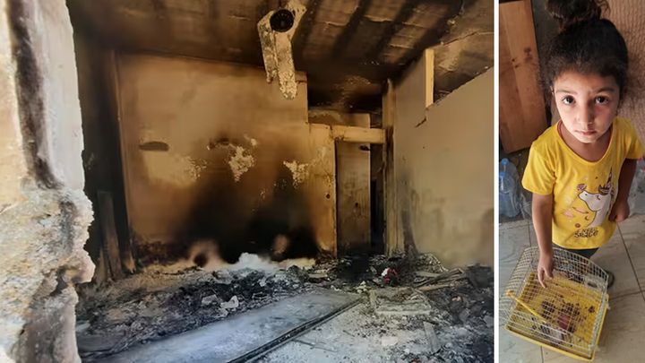 A dwelling destroyed during the Israeli army operation.  On the right, Raja's 4-year-old daughter continues to carry her caged bird, which died two days ago.  (FREDERIC METEZEAU / RADIO FRANCE)