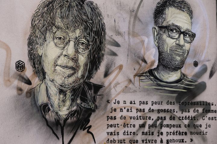 Portraits de Cabu et Charb signés du pochoiriste C215, janvier 2016 
 (JOEL SAGET / AFP)