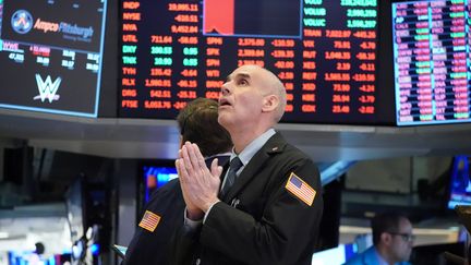 Un trader à la bourse de New York (Etats-Unis), le 18 mars 2020. (BRYAN R. SMITH / AFP)