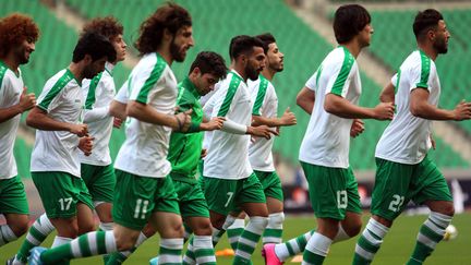 L'équipe nationale de football de l'Irak, lors d'un entraînement le 27 février 2018 à Bassora (Irak).&nbsp; (HAIDAR MOHAMMED ALI / AFP)