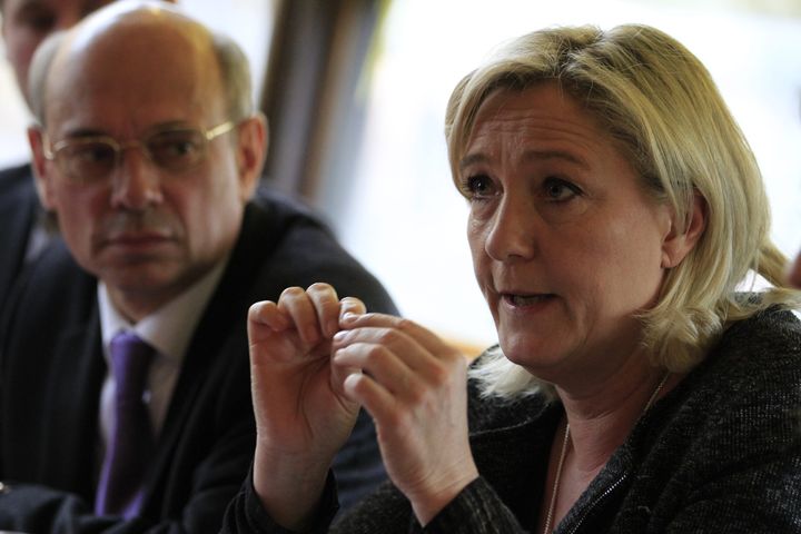 Jean-Luc Schaffhauser (à gauche) et Marine Le Pen, le 26 février 2014. (HERVE KIELWASSER / MAXPPP)