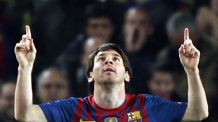 Lionel Messi, le joueur de foot du FC Barcelone, auteur de cinq buts contre le Bayer Leverkusen lors d'un match de la Ligue des champions &agrave; Barcelone (Espagne), le 7 mars 2012. (GUSTAU NACARINO / REUTERS)