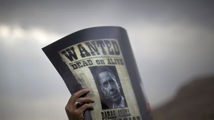 Pendant une manifestation de soutien au programme nucl&eacute;aire iranien &agrave; Isfahan (Iran), le 15 novembre 2011. (MORTEZA NIKOUBAZL / REUTERS)