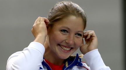 La joie de C&eacute;line Goberville, premi&egrave;re fran&ccedil;aise m&eacute;daill&eacute;e aux JO de Londres. (MARWAN NAAMANI / AFP)