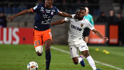 Thomas Lemar en duel avec Mukiele (PASCAL GUYOT / AFP)