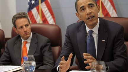 Barack Obama et Timothy Geithner, secrétaire au Trésor américain (© AFP Mandal Ngan)