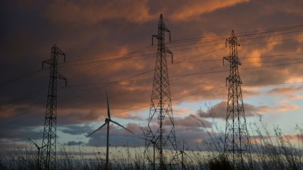 Emmanuel Macron a annoncé, le 14 juillet 2022, un plan de sobriété énergétique sur le gaz et l'électricité. (GUILLAUME SOUVANT / AFP)