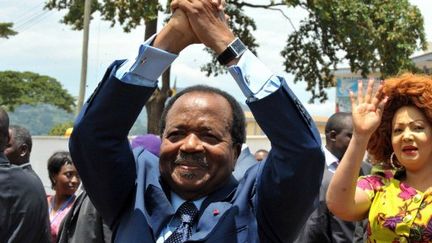 Paul Biya et son épouse le 9 octobre 2011, Yaounde. (SEYLLOU / AFP)