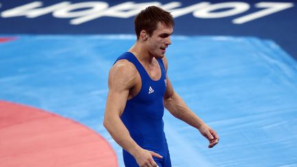 Steeve Guénot ne tentera pas de décrocher une troisième médaille à Rio. (MANAN VATSYAYANA / AFP)