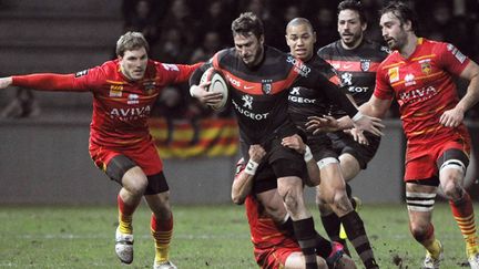 Maxime Médard (Toulouse) perce au coeur de la défense de Perpignan