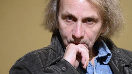 Michel Houellebecq lors de son exposition de photographie "Before Landing" au Pavillon Carré de Baudouin, le 5 novembre 2014 à Paris.
 (MIGUEL MEDINA / AFP)