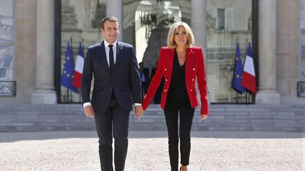 Emmanuel et Brigitte Macron à l'Elysée, à Paris, le 6 juillet 2017. (AFP)