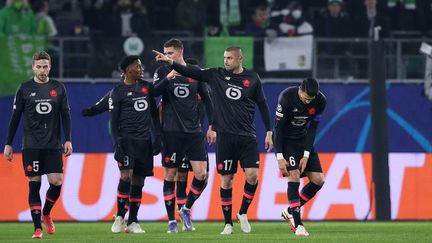 Les Lillois lors de leur match à Wolfsburg, en Allemagne, le 8 décembre 2021, en&nbsp;phase de groupes de la Ligue des champions. (RONNY HARTMANN / AFP)