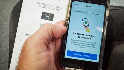 L'application TousAntiCovid, le 29 juin 2021. (MATHIEU THOMASSET / HANS LUCAS / AFP)