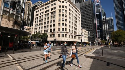 Les rues de Sydney, en Australie, commencent lentement à se vider face à l'épidémie de coronavirus (PETER PARKS / AFP)