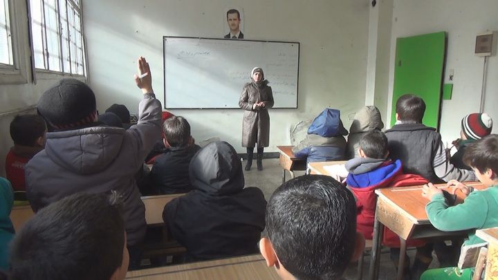 Cours de langue arabe dans une école d'Alep-Est, en Syrie, en janvier 2017. (GILLES GALLINARO / RADIO FRANCE)