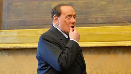 L'ancien pr&eacute;sident du Conseil italien, Silvio Berlusconi, le 19 f&eacute;vrier 2014 &agrave; Rome (Italie). (ANDREAS SOLARO / AFP)